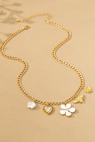 Gold & white charm necklace
